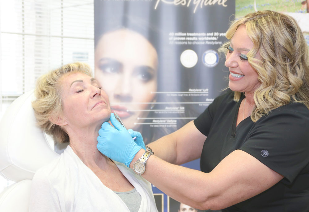 Injections Nurse Laura Allen with patient at Cibolo Creek Dermatology Group.